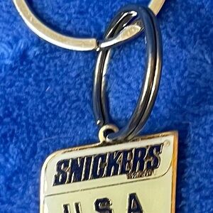 1991 Mars, inc. Snickers USA Olympic Keychain.